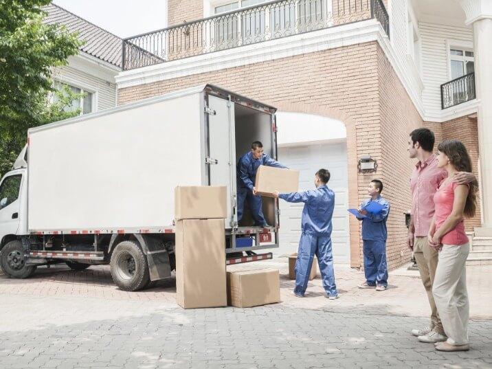 professional movers packing boxes for a long distance move in Marina